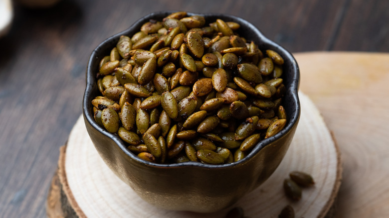 roasted pumpkin seeds in bowl