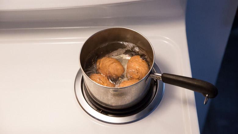 eggs cooking in boiling water