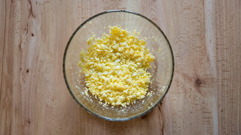 mashed boiled eggs in bowl
